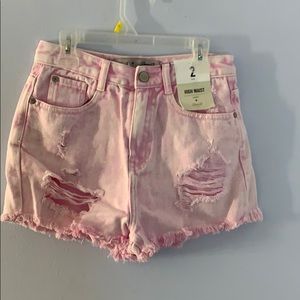 Pink ripped jean shorts